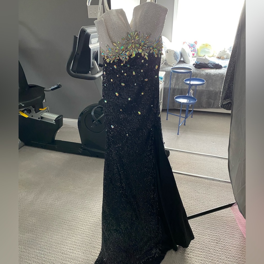 Long, form fitting dress.